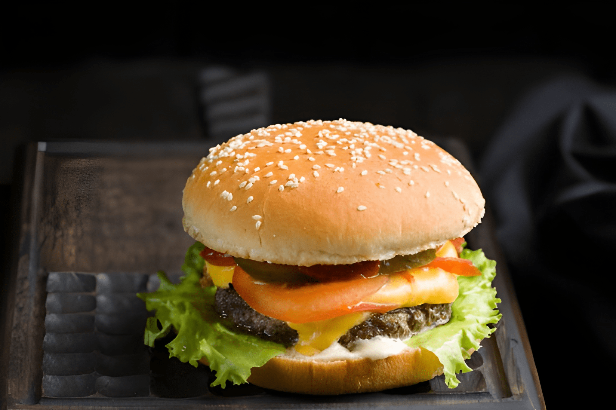 A Juice Sesame Bun on a wooden surface