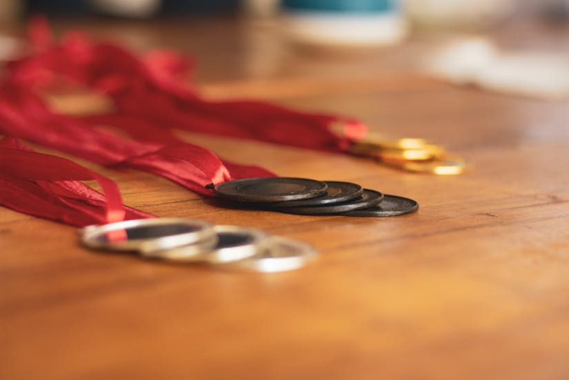 Gold, Silver and Bronze Medals on Table. Pragyan Bezbaruah from Pexels