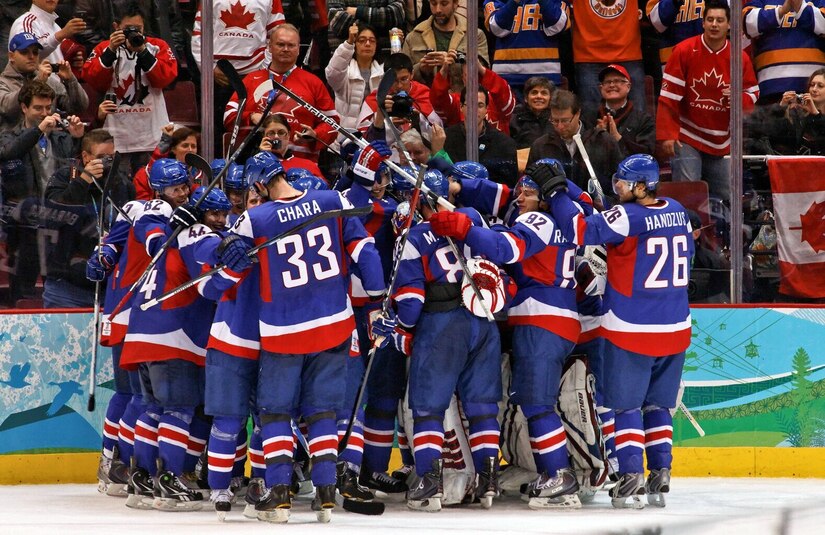 The Slovakia men's ice hockey team celebrates their victory over Sweden during the 2010 Winter Olympics. Photo by S. yume on Wikimedia Commons (CC BY-2.0)