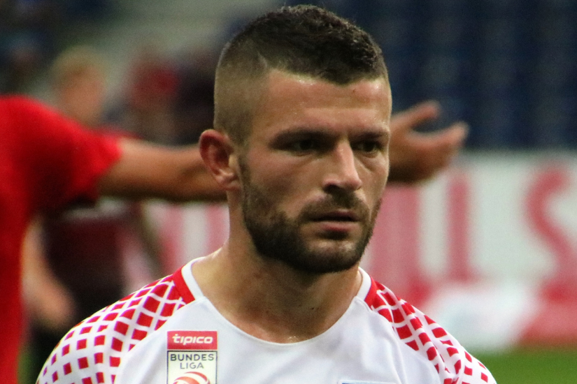 _Werner100359 Kosovo CC BY-SA 4.0 Valon Berisha &mdash; a major figure of modern Kosovo football &mdash; in action for FC Red Bull Salzburg in the Austrian Bundesliga